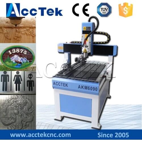 China Cheap hot sale 6090 2x3 feet small cnc router for aluminum wood stone copper acrylic dibond