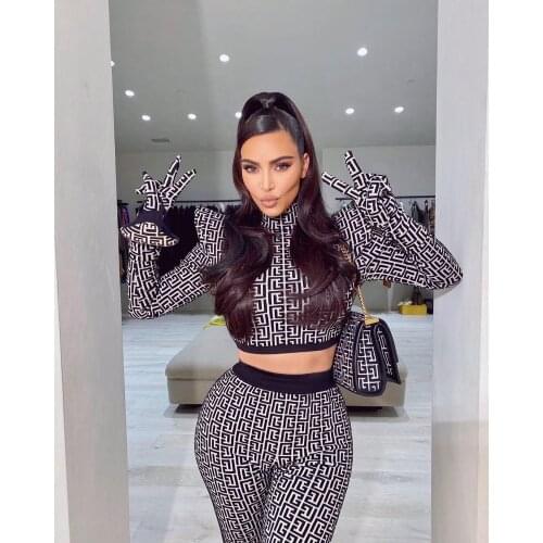 Free shipping High quality black and white jacquard with long sleeves round neck and tight pants rayon bandage two-piece set