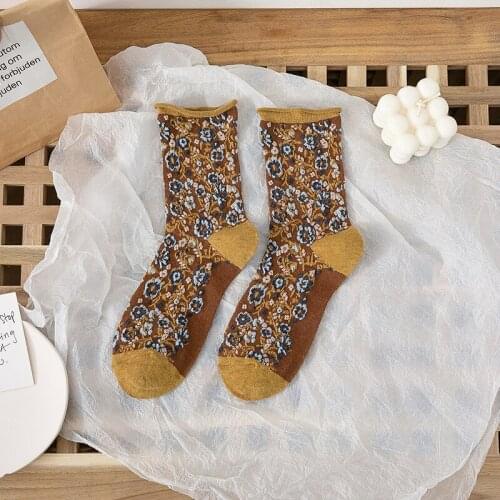 Womens socks ins tide tube socks autumn and winter retro ethnic style embossed cute small floral ladies long pile of socks