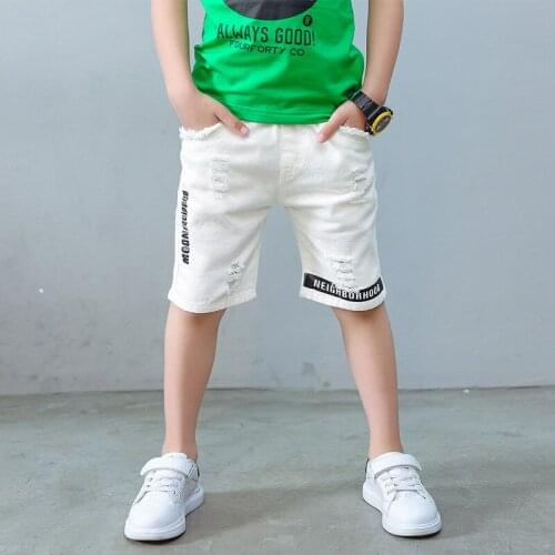 Boy Knee Length pants Summer 2020 Shredded Soft Denim Pants Boy White Pants Loose Tide