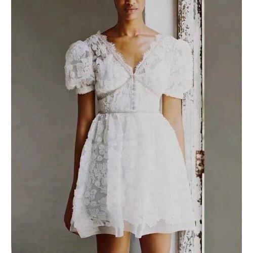 Early autumn new V-neck diamond lace hollow slim three-dimensional white mini dress
