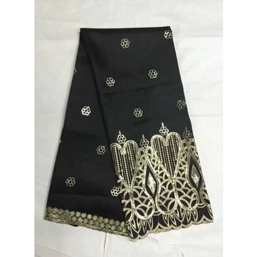 Wholesale african guipure lace fabric with sequins new design nigerian swiss african george lace fabric for wedding dress
