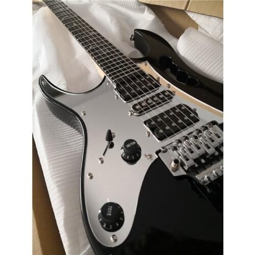 Free shipping custom 6 string left hand guitar,black guitar,maple neck,tremolo bridge,mirror pickupguard,black button