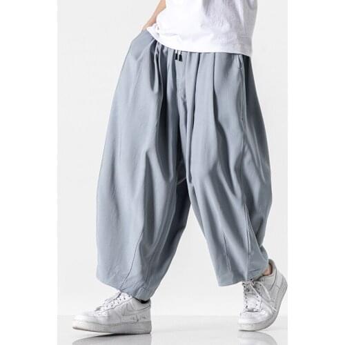 Plus Size 5XL Mens Fashion Solid Color Elastic Waist Casual Wide Leg Pants Man Streetwear Wild Loose Hip Hop Harem Pants Male