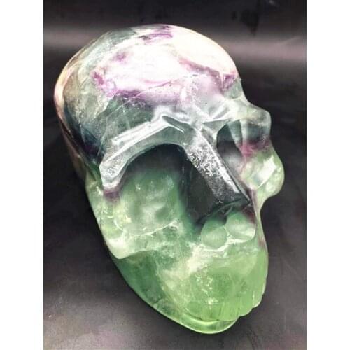 Skulls are hand-carved with natural quartz crystal fluorite
