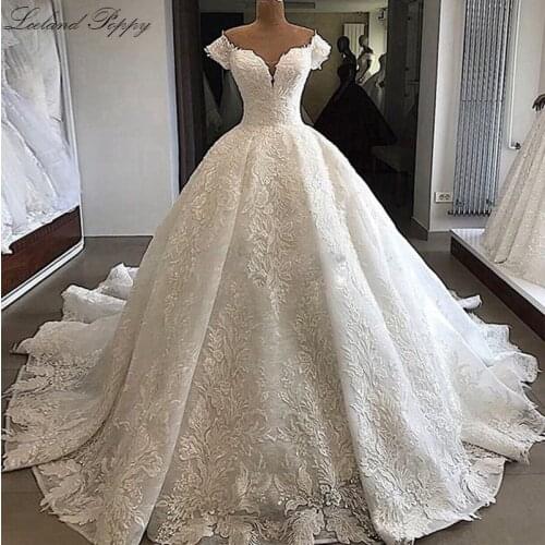 Luxury A-line Lace Wedding Dresses 2021 Plus Size V-neck Short Sleeve Floor Length Beade Appliques Bridal Gowns Vestido de Noiva