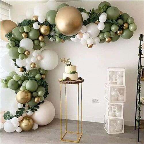 Web celebrity avocado green color restoring ancient ways baby balloon party party scene atmosphere arrangement background props