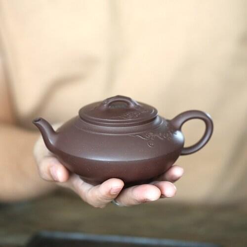 Monohydrate hall yixing undressed ore pure manual recommended lingyun purple clay pot of 320 ml flexibly moire figure