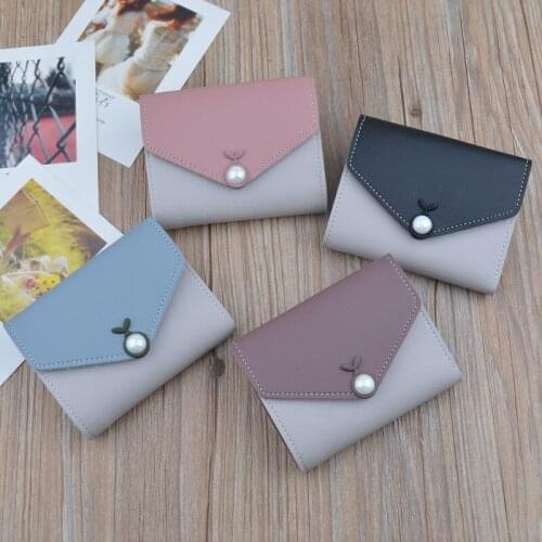 The new womens short wallet wallet wallet Korean version hit color simple personality hand mini zero wallet