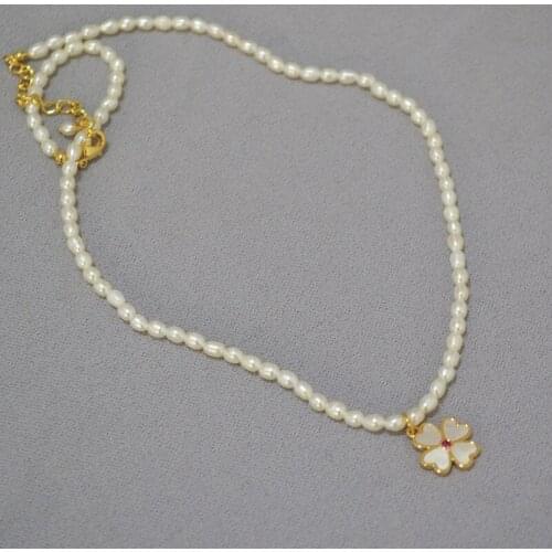 Freshwater pearl necklace with clover white shell pendant zircon inset choker for women