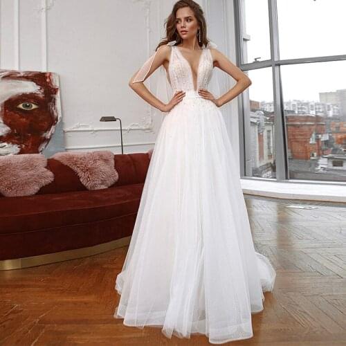 Boho Princess Wedding Dress Sexy V Neck Sheer Straps Sleeveless Pearls tulle Romantic Beach Wedding Gown for Bride 2021