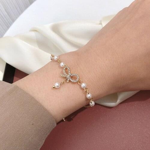2021 New Classic Pearl Bracelet Crystal Bow Pendant Bracelet Korean Sexy Jewelry Accessories Party WomenS Bracelet