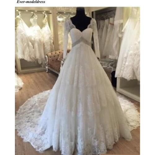 Sheer Long Sleeves Wedding Dress Lace Appliques Crystal Beaded V-Neck Zipper Back Luxury Bridal Gowns Vestido de noiva 2019