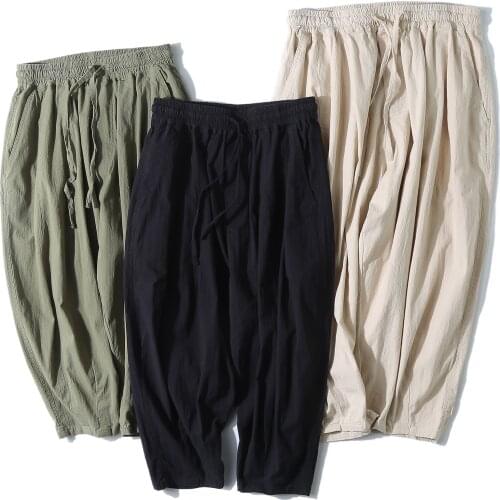 The new summer trousers for men Loose cotton and linen slacks Linen broad-legged slacks Men and women with