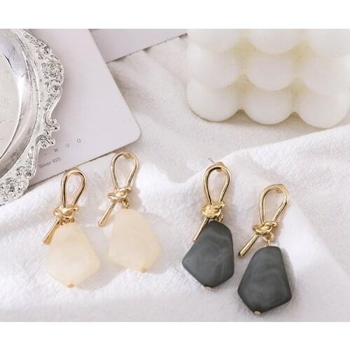 2020 new Korean stylish metallic knotted earrings simple and irregular for women stud earrings