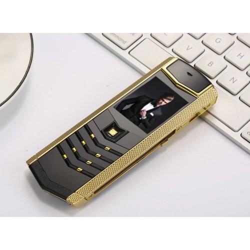 GSM Dual SIM Luxury metal+leather mobile phone original china gift bluetooth mp3 camera recorder Cell Phones