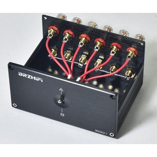 No need power adapTwo power amplifiers and two pairs of speakers switcher two input one output power amplifier speaker switcher