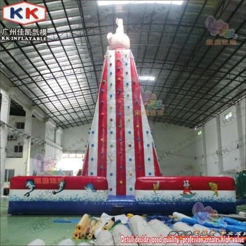 Huge Kids Inflatable Sport Games ,9 * 9M KK Rocky Mountain Inflatable Climbing Wall With Safety Belt
