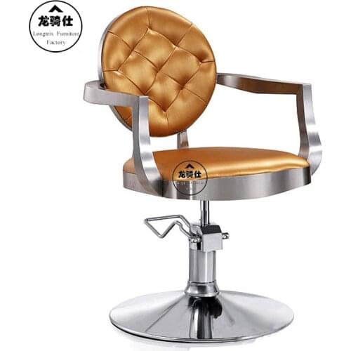 Gold euramerican style design. Hairdressing chair. Barber chair