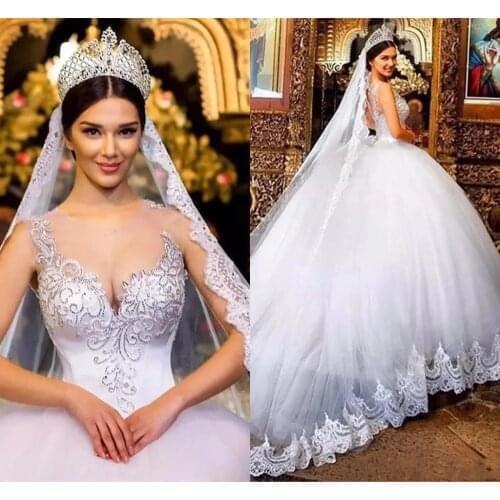 2020 Ball Gown Wedding Dresses Sheer Neck Lace Applique Beads Crystal Hollow Back Court train Back Plus Size Bridal Gowns