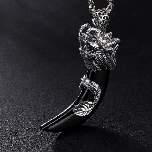 Pure silver jet pulp bibcock dragon teeth to restore ancient ways personality domineering joker men pendants wholesale