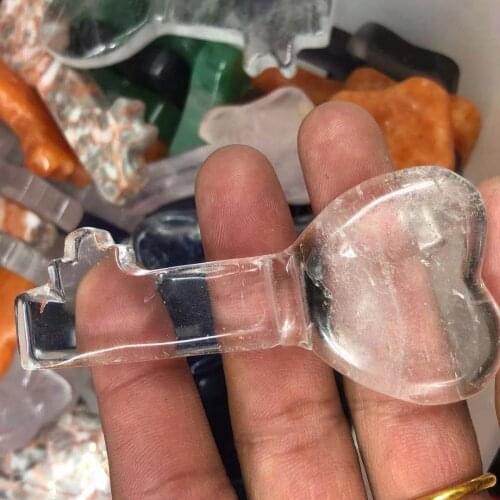 Natural white crystal carved key for Reiki processing