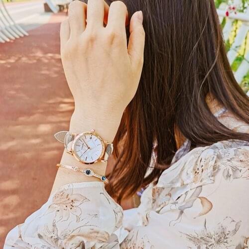 Fashion all-match British style belt female watch with calendar temperament plaid stitching watch