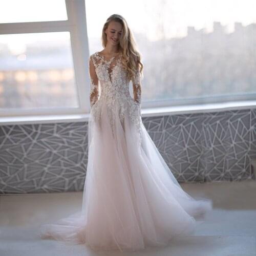A-line Long Sleeves Beautiful Lace with Crystal Pink Wedding Dress 2021 Illusion Back Nude Illusion Neck Bridal Dresses
