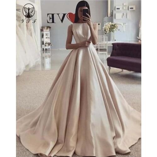 Simple but Elegant O Neck Sleeveless Pleated Low V Back Sweep Train Spring Champagne Wedding Dresses