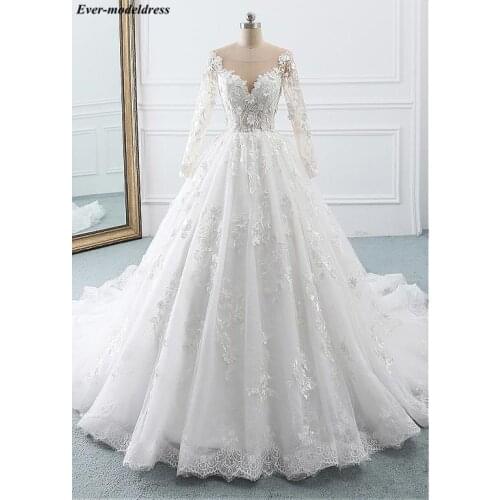Long Sleeves Wedding Dresses Plus Size Lace Appliques Sheer O-Neck Button Back Sweep Train 2020Bridal Gowns Vestido De Noiva