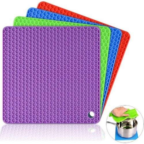 Multifuntional Heat Resistant Hot Pad Silicone Pot Holder jar Opener Spoon Rest and Garlic Peeler Flexible Durable Dishwasher 7"