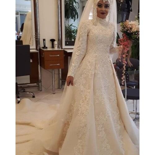 2020 A Line Wedding Dresses Muslim Long Sleeve Lace Appliques Sequins Long Train Dubai Arabic Wedding Dresses Bridal Gown