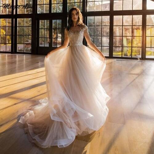 Magic Awn Graceful Princess Wedding Dresses Lace Appliques Long Sleeves Illusion Wedding Party Dress A-Line Abito Da Sposa 2021