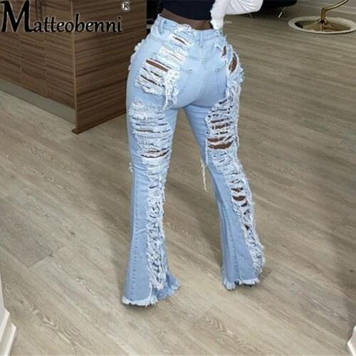2021 Spring Women Fashion Flared Jeans Women Holes Ripped Hollow Out Jeans New Tight High Waist Zipper Blue Jeans Wide Leg Pants