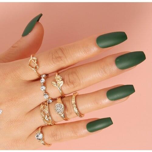 Pack of 7 personality creative knuckle rings with carved Flowers / winding heart shape /flower and inlay acrylic gem design