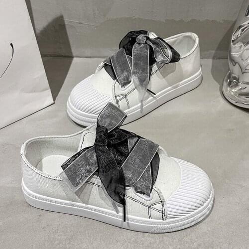 2021 Summer and Autumn New Canvas White Shoes Womens Board Shoes Bow Tie Straps Flat Shoes Breathable Sports Womens Shoes Tide