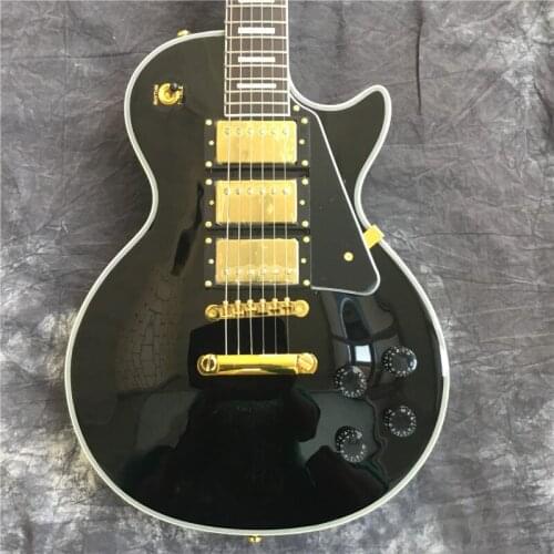 Wholesale high quality custom shop black electric guitar rosewood fingerboard. Golden hardware. 3 pickups