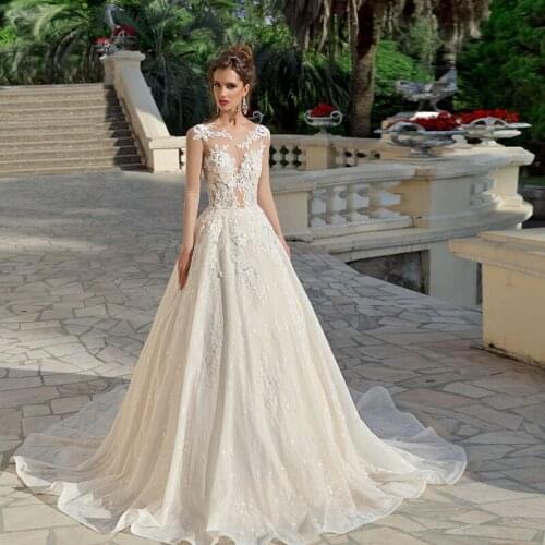 Beautiful See Through Lace Bridal Gowns 2021 A Line Applique Tulle Sweep Train Wedding Dress Custom Made