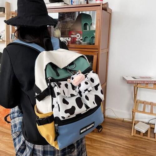 New cow grain girl backpack large capacity multi-pocket waterproof nylon schoolbag fashion Korean academy wind color backpack