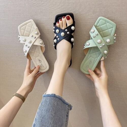 Crossed flip flops for women in 2021 summer fashion with pearl studded slippers