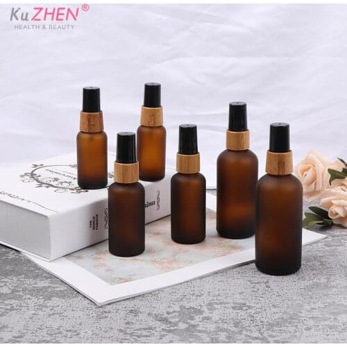 New 30ml 50ml 100ml Fine Spray Mist Amber Glass Spray Bottle Refillable Cosmetic Container With Eco Friendly Wood Bamboo Cap