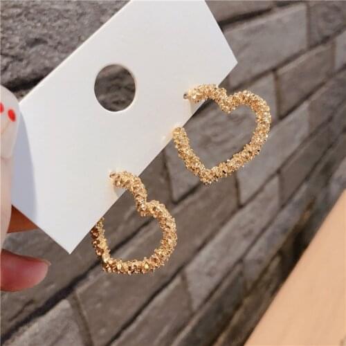 Personality contracted senior metal feeling love pearl earring female temperament web celebrity geometry stud earrings