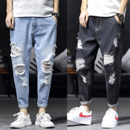 Wholesale 2020 teenagers cowboy Denim Japanese loose ripped jeans mens rotten pants straight scratched beggar harem pants