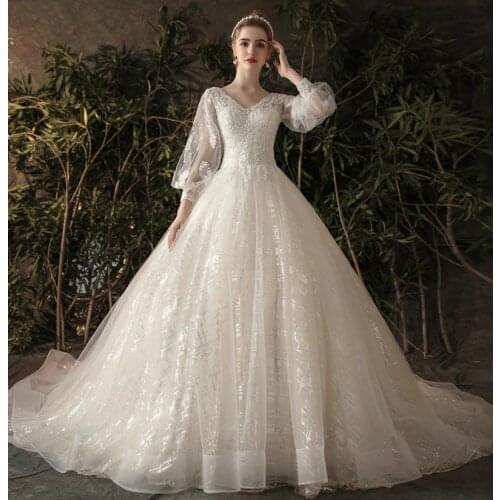 Vestido De Noiva Princesa Lantern Sleeve Glitter Vintage Wedding Dresses 2021 Sexy Illusion Beads V-Neck Court Train Bridal Gown