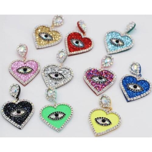 Heart shaped eye studs Fashion temperament gorgeous simple heart-shaped tourist street shoot catwalk nightclub earrings 620