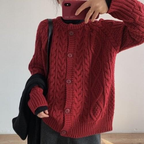 Retro sweater jacket 2021 autumn and winter long-sleeved round neck solid color knitted cardigan all-match womens clothing