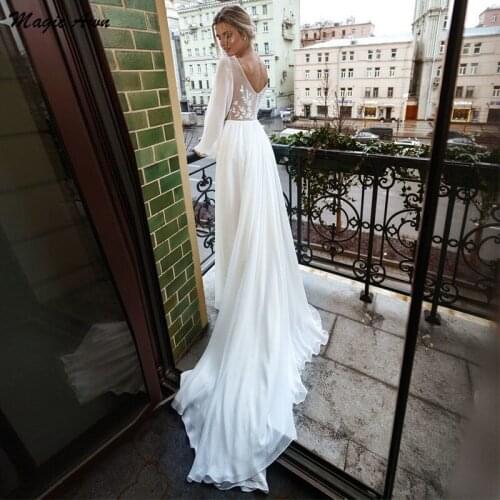 Magic Awn Full Puffy Sleeves Beach Wedding Dresses Lace Appliques V-Neck Illusion Boho Bride Dress With Train Abito Da Sposa