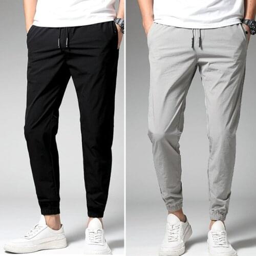 2021 Summer Ice Silk Pocket Trousers Mens Casual Jogging Sports Outdoor Fashion Baggy Pants Plus Size Mens Clothing