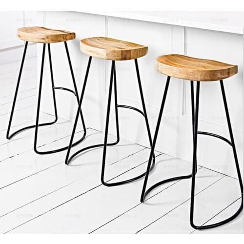 The wooden bar chair of the home is real wood. Tall stool. Chair stool