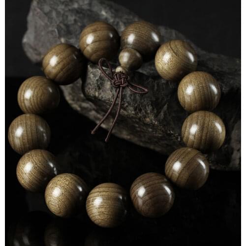 Sichuan Jinsi Nanmu old wood smooth material cat eye green material